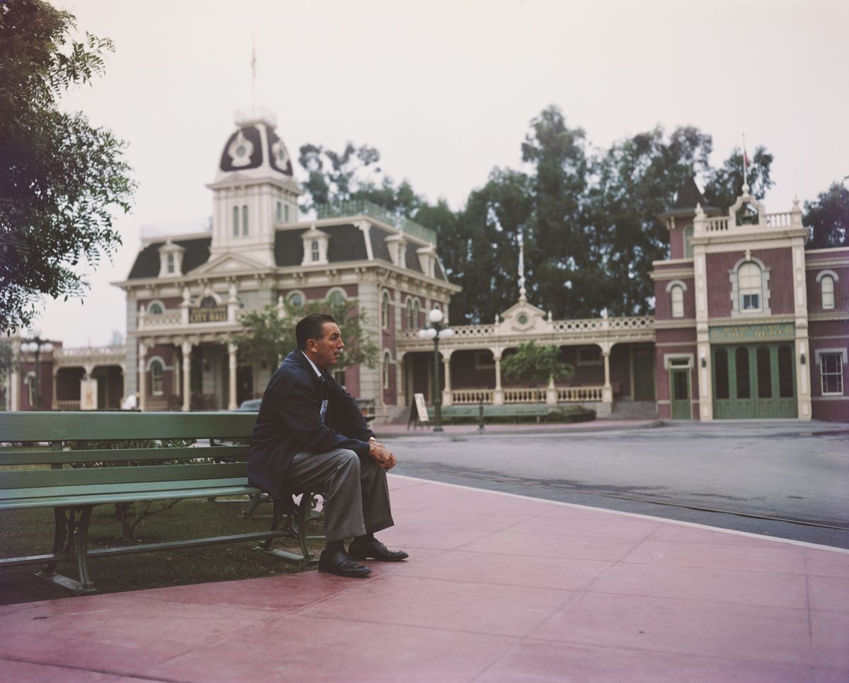 Portrait of American movie producer, artist, and animator Walt Disney (1901 - 1966) as he sits on a bench in his Disneyland amusement park, Anaheim, California, 1950s. (Photo by Gene Lester/Getty Images) (Gene Lester/Getty Images)