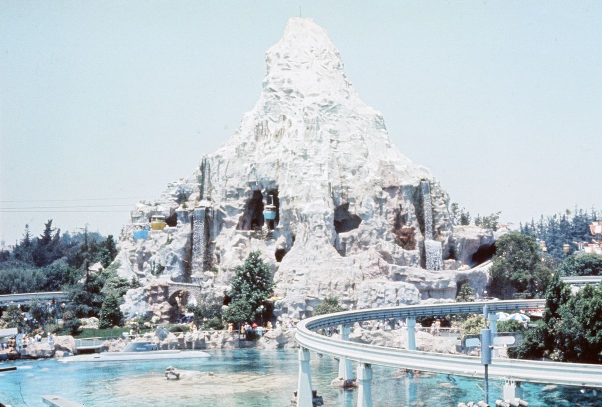 Scenes at the Disneyland theme park in Anaheim, California, United States. Cable cars passinghe Matterhorn mountain attraction and submarine base on the resort. June 1970. (Photo by Monte Fresco/Mirrorpix/Getty Images) (Monte Fresco/Mirrorpix/Getty Images)