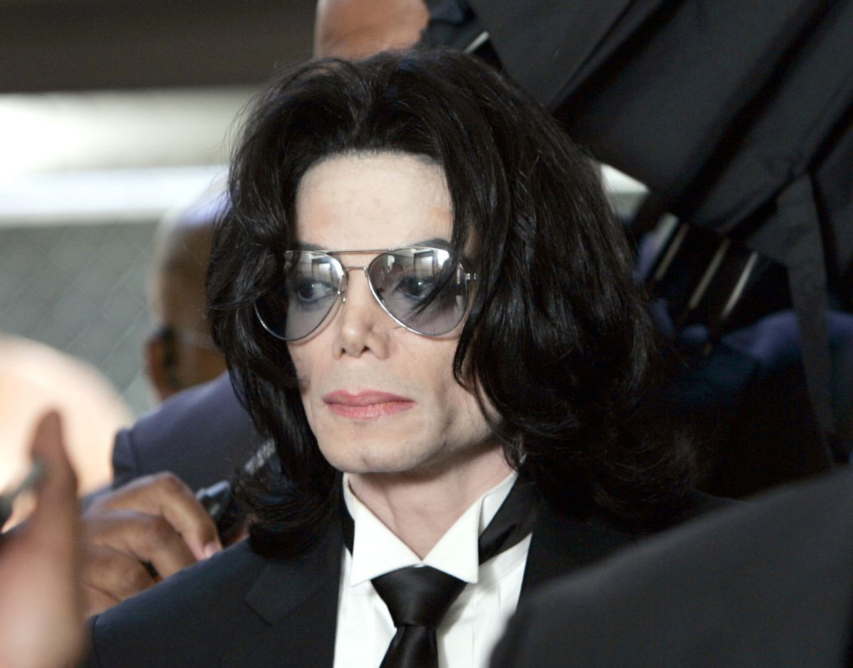 SANTA MARIA, CA - JUNE 13:  Michael Jackson prepares to enter the Santa Barbara County Superior Court to hear the verdict read in his child molestation case June 13, 2005 in Santa Maria, California. After seven days of deliberation the jury has reached a not guilty verdict on all 10 counts in the trial against Michael Jackson. Jackson was charged in a 10-count indictment with molesting a boy, plying him with liquor and conspiring to commit child abduction, false imprisonment and extortion. He pleaded innocent.  (Photo by Kevork Djansezian-Pool/Getty Images) (Kevork Djansezian-Pool/Getty Images)