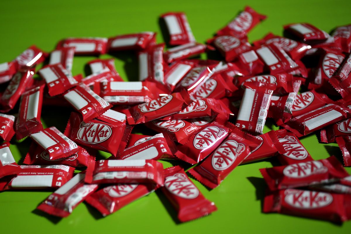 In this picture taken on August 24, 2017, KitKat chocolates are seen in a production line at the KitKat factory in Inashiki, Ibaraki prefecture, northeast of Tokyo.
KitKats have been around in Britain since 1935 and only arrived in Japan in 1973, but the Japanese market has a crucial unique selling point -- a huge variety of different flavours. / AFP PHOTO / Behrouz MEHRI / TO GO WITH Japan-food-consumers by Anne Beade        (Photo credit should read BEHROUZ MEHRI/AFP/Getty Images) (BEHROUZ MEHRI/AFP/Getty Images)