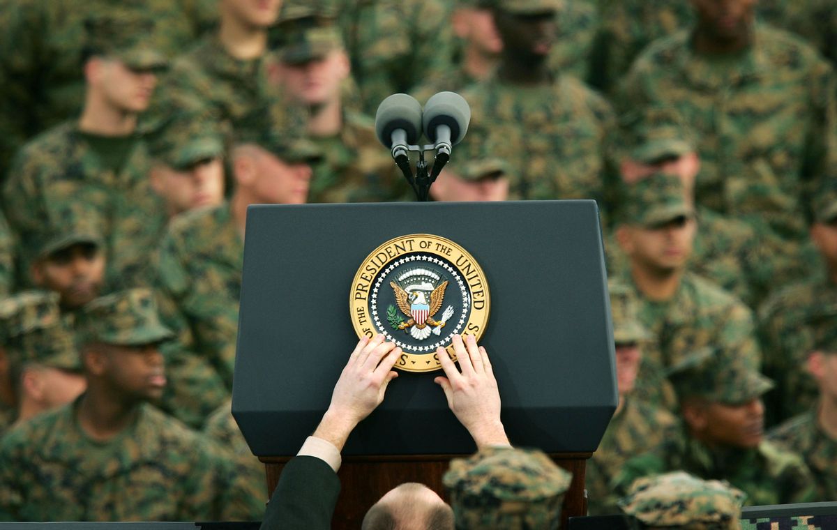 CAMP PENDLETON, CA - DECEMBER 7:  The presidential seal is placed on the podium prior to U.S. President George W. Bush speech to Marines during his visit on the 63rd anniversary of the Japanese attack on Pearl Harbor December 7, 2004 at Camp Pendleton, California. More than 21,000 Marines serving in Iraq and neighboring nations are part of the 1st Marine Expeditionary Force based at Camp Pendleton, which has one of the highest casualty rates in the U.S.-led war in Iraq.  (Photo by David McNew/Getty Images) (David McNew/Getty Images)