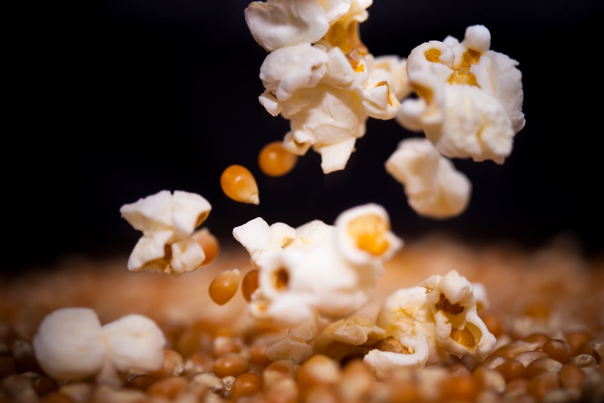 Macro photo of popcorn kernels popping (Getty Images, stock)