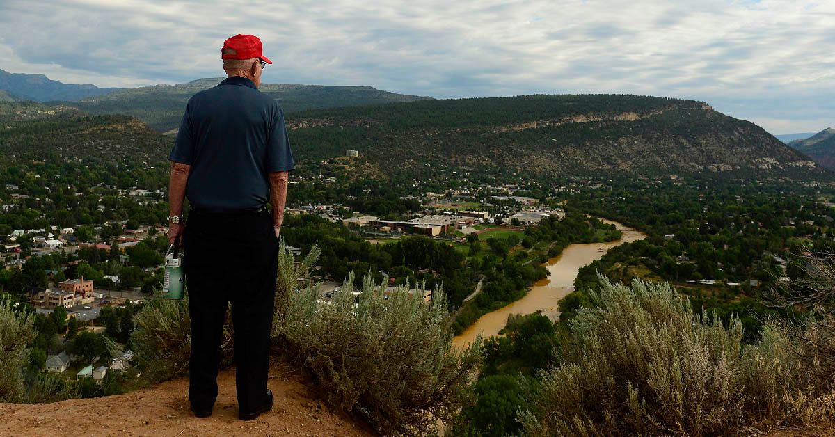 DURANGO, CO - AUGUST 7: Mack Goshorn, from Loveland, looks out over the city of Durango on August 6, 2015 along Animas River. Goshorn, a resident of Durango from 1941 to 1955, came back to the city for a funeral of a high school friend. Over a million gallons of mine wastewater has made it's way into the Animas River closing the river and put the city of Durango on alert. (Photo By Brent Lewis/The Denver Post via Getty Images) (Brent Lewis/The Denver Post via Getty Images)