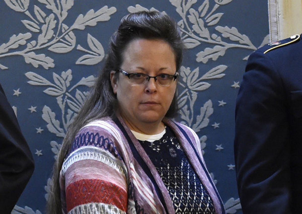 Kim Davis, the Rowan County clerk in Kentucky, arrives before US President Barack Obama delivers the State of the Union Address during a Joint Session of Congress at the US Capitol in Washington, DC, January 12, 2016. Kim Davis, a born-again Christian, was jailed briefly in September 2015 for contempt of court after refusing to issue marriage  licenses due to her opposition to gay marriage, which the Supreme Court legalized across the United States in June. Barack Obama will give his final State of the Union address, perhaps the last big opportunity of his presidency to sway a national audience and frame the 2016 election race. AFP PHOTO / SAUL LOEB / AFP / SAUL LOEB        (Photo credit should read SAUL LOEB/AFP/Getty Images)