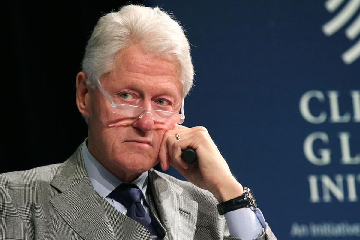 Former President Bill Clinton listens during a plenary session at the Clinton Global Initiative Winter Meeting on Tuesday, Feb. 10, 2015 in New York. (Photo by Greg Allen/Invision/AP)