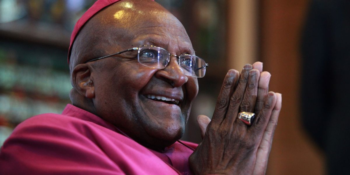 Nobel Peace Laureate Archbishop Desmond Tutu gestures during a press conference about the first 20 years of freedom in South Africa at St Georges Cathedral in Cape Town on April 23,2014.  Tutu today celebrated 20 years of freedom in South Africa as a "heck of an achievement", while confirming that he would not vote for the government in May 7 elections. Anglican archbishop emeritus Tutu, 82, is still regarded as a moral beacon for South Africa in the mould of the first post-apartheid president Nelson Mandela, who led the country from 1994 to 1999. AFP PHOTO/JENNIFER BRUCE        (Photo credit should read JENNIFER BRUCE/AFP/Getty Images) (Skoll Foundation/Flickr)
