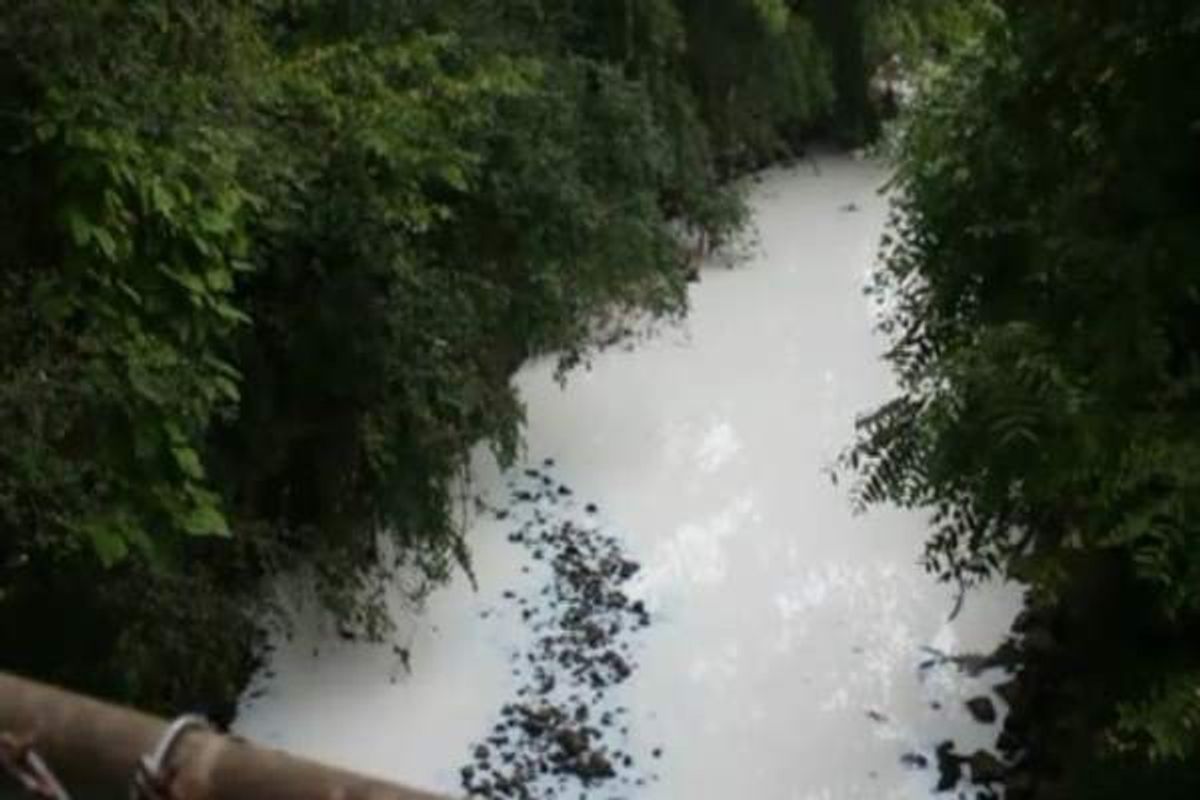 Coldwater Creek in Hazelwood, Missouri is seen after it was turned white after a 'liquid concrete additive' spill.  (KSDK-TV)