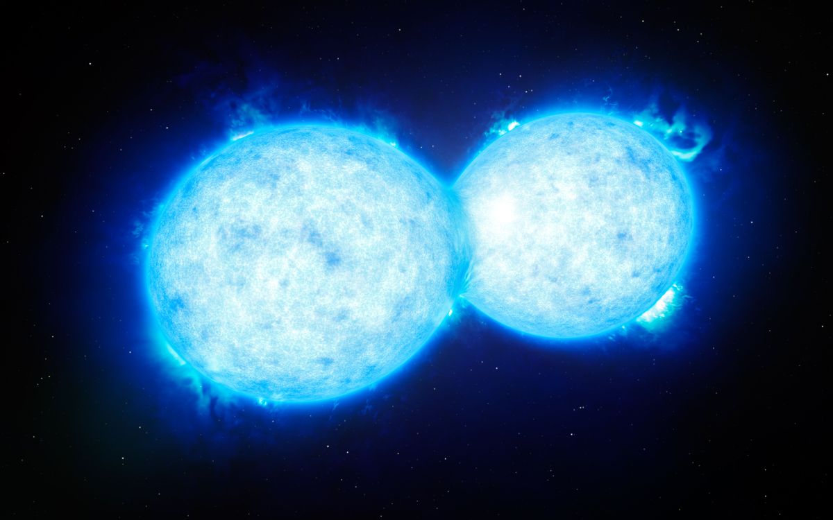 This artist’s impression shows VFTS 352 — the hottest and most massive double star system to date where the two components are in contact and sharing material. The two stars in this extreme system lie about 160 000 light-years from Earth in the Large Magellanic Cloud. This intriguing system could be heading for a dramatic end, either with the formation of a single giant star or as a future binary black hole. (ESO/L. Calçada)