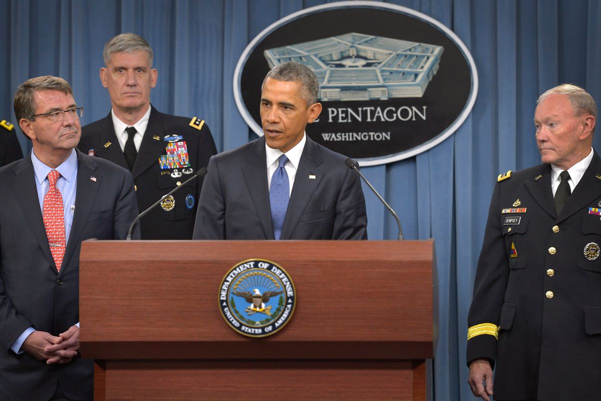President of the United States Barack Obama addresses the media in the Pentagon Press Briefing Room after meeting with Secretary of Defense Ash Carter, left, at the Pentagon, July 6, 2015. At right is Chairman of the joint Chiefs of Staff Martin E. Dempsey. DoD Photo by Glenn Fawcett (Released)