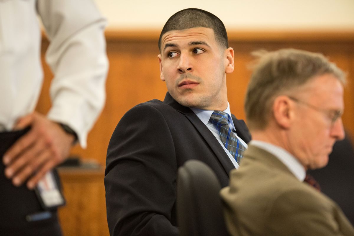 FALL RIVER, MA - MARCH 31: Aaron Hernandez watches as Robert Kraft entered the courtroom during the murder trial of former New England Patriots tight end at Bristol County Superior Court in Fall River, Mass. Hernandez is accused of the June 2013 killing of Odin Lloyd. (Photo by Aram Boghosian for The Boston Globe via Getty Images) (Aram Boghosian for The Boston Globe via Getty Images)