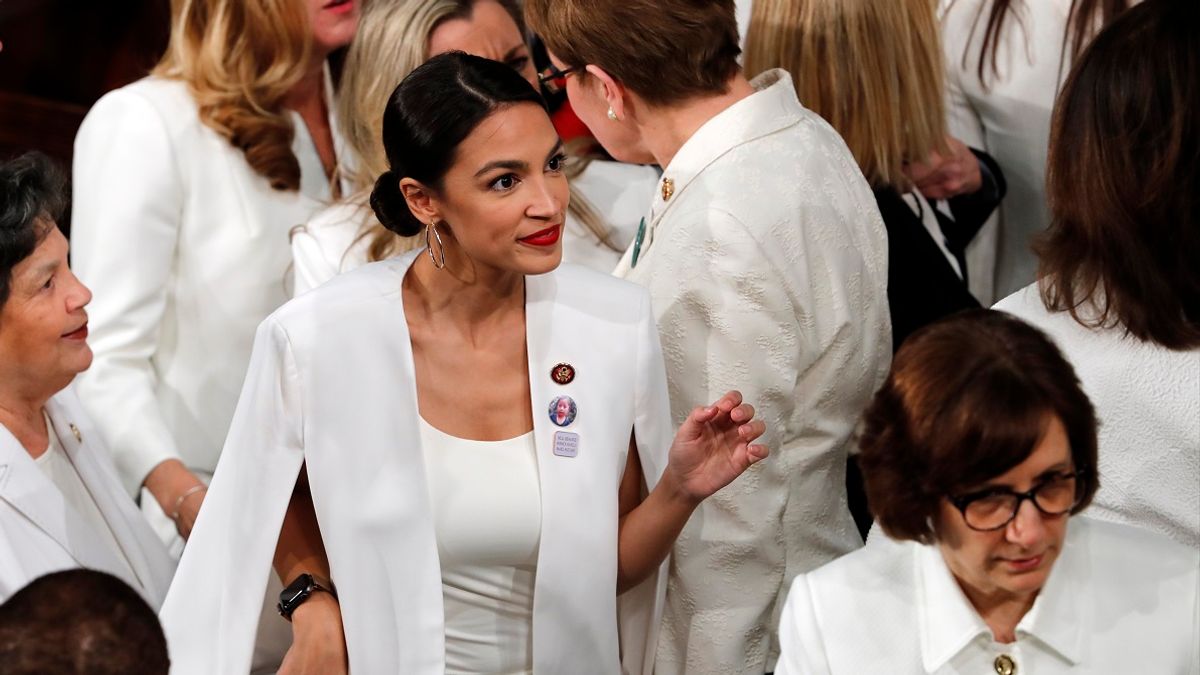 Democratic members of Congress, including Rep. Alexandria Ocasio-Cortez, D-N.Y., center, arrive before President Donald Trump delivers his State of the Union address to a joint session of Congress on Capitol Hill in Washington, Tuesday, Feb. 5, 2019. (AP Photo/J. Scott Applewhite) (AP)