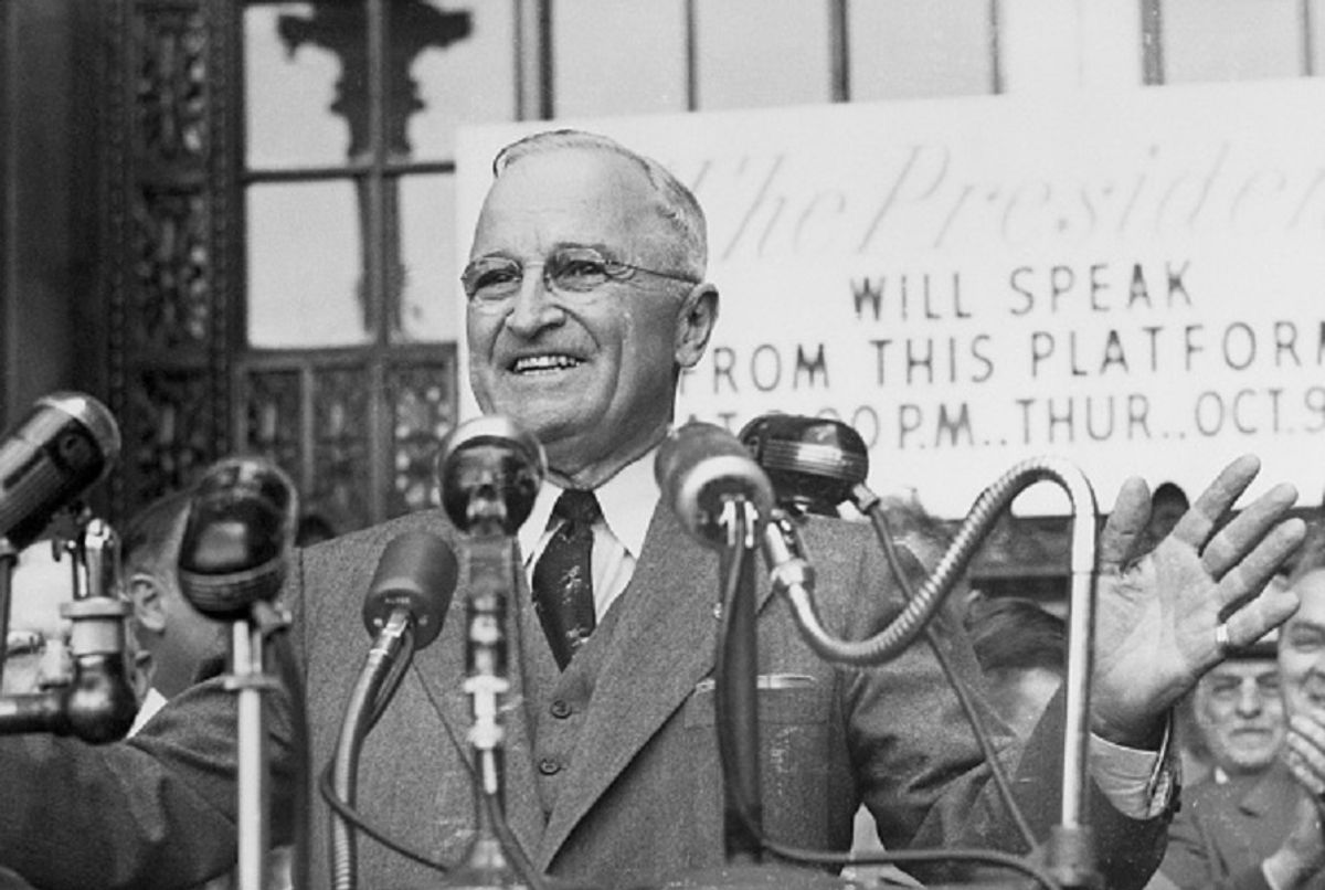 (Original Caption) 10/10/1952-Cleveland, OH: President Truman responds with a warm smile as he is greeted by an estimated 30,000 persons in Cleveland's Public Square, Oct. 9. The President spoke here on the homeward leg of his 8,500-mile whistle stop assault against the Republicans. (Getty Images)