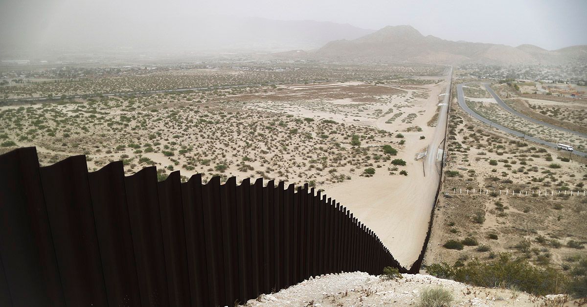 CIUDAD JUAREZ, MEXICO - MAY 20: The border barrier between the U.S. (L) and Mexico runs down a hillside on May 20, 2019 as taken from Ciudad Juarez, Mexico. Approximately 1,000 migrants per day are being released by authorities in the El Paso sector of the U.S.-Mexico border amidst a surge in asylum seekers arriving at the Southern border. (Photo by Mario Tama/Getty Images) (Photo by Mario Tama/Getty Images)