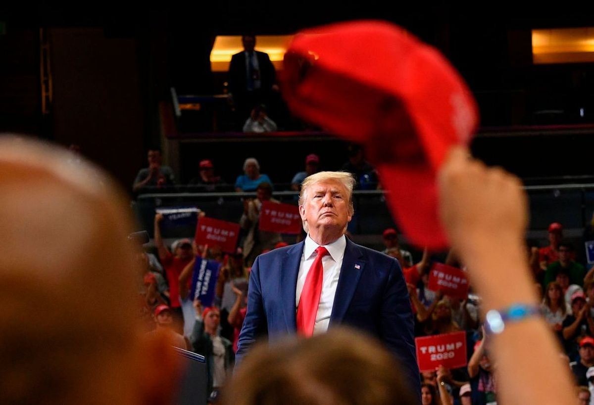 TOPSHOT - US President Donald Trump speaks during a rally at the Amway Center in Orlando, Florida to officially launch his 2020 campaign on June 18, 2019. (Photo by MANDEL NGAN / AFP)        (Photo credit should read MANDEL NGAN/AFP/Getty Images) (Getty Images)