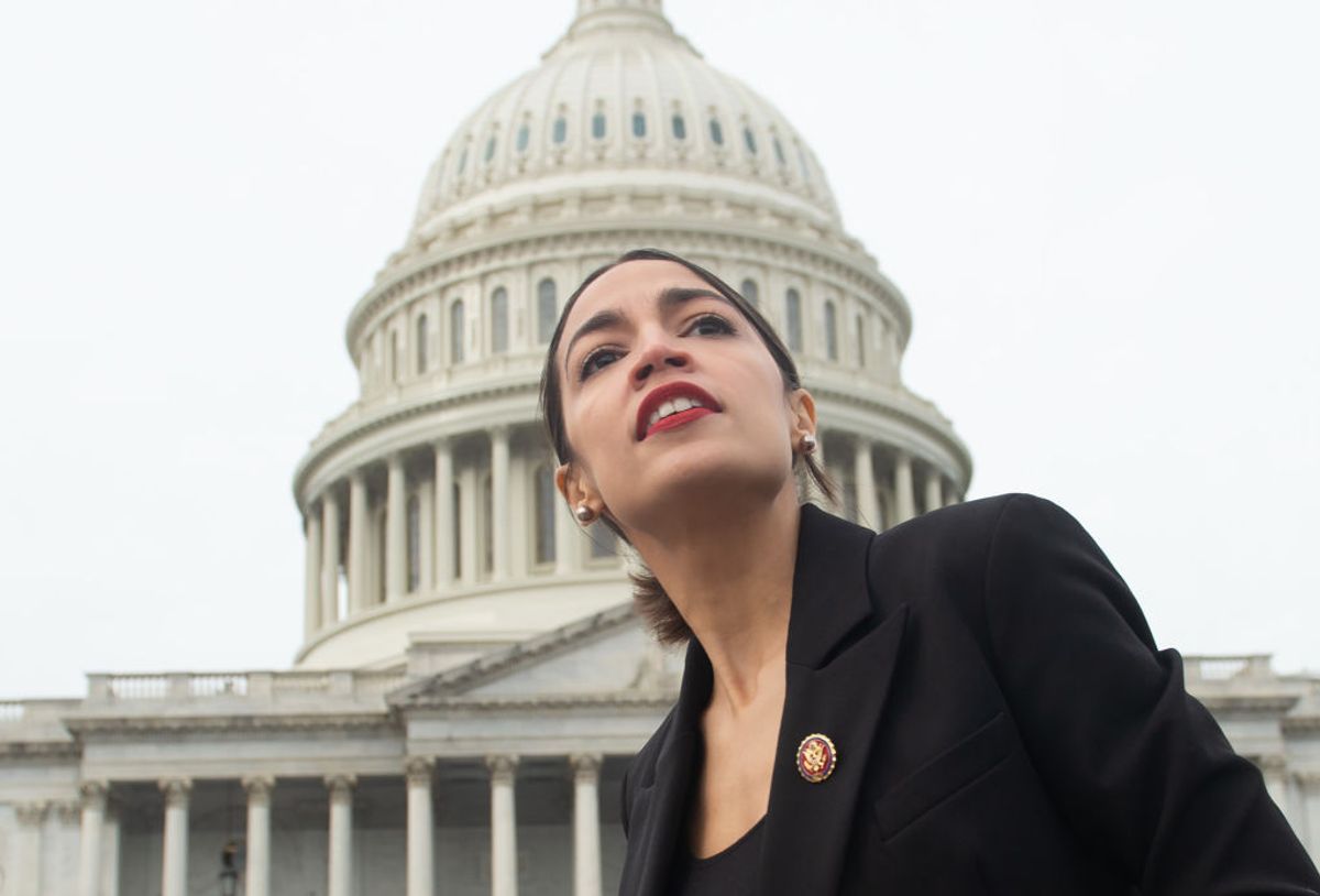 TOPSHOT - US Representative Alexandria Ocasio-Cortez, Democrat of New York, leaves a photo opportunity with the female Democratic members of the 116th US House of Representatives outside the US Capitol in Washington, DC, January 4, 2019. (Photo by SAUL LOEB / AFP)        (Photo credit should read SAUL LOEB/AFP/Getty Images) (Getty Images)