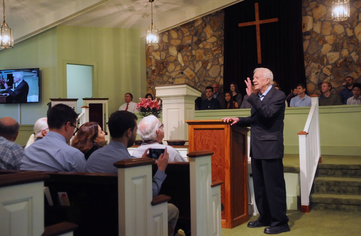 Former U.S. President Jimmy Carter speaks to the congregation at Maranatha Baptist Church before teaching Sunday school in his hometown of Plains, Georgia on April 28, 2019. Carter, 94, has taught Sunday school at the church on a regular basis since leaving the White House in 1981, drawing hundreds of visitors who arrive hours before the 10:00 am lesson in order to get a seat and have a photograph taken with the former President and former First Lady Rosalynn Carter.  (Photo by Paul Hennessy/NurPhoto via Getty Images) (Getty Images)