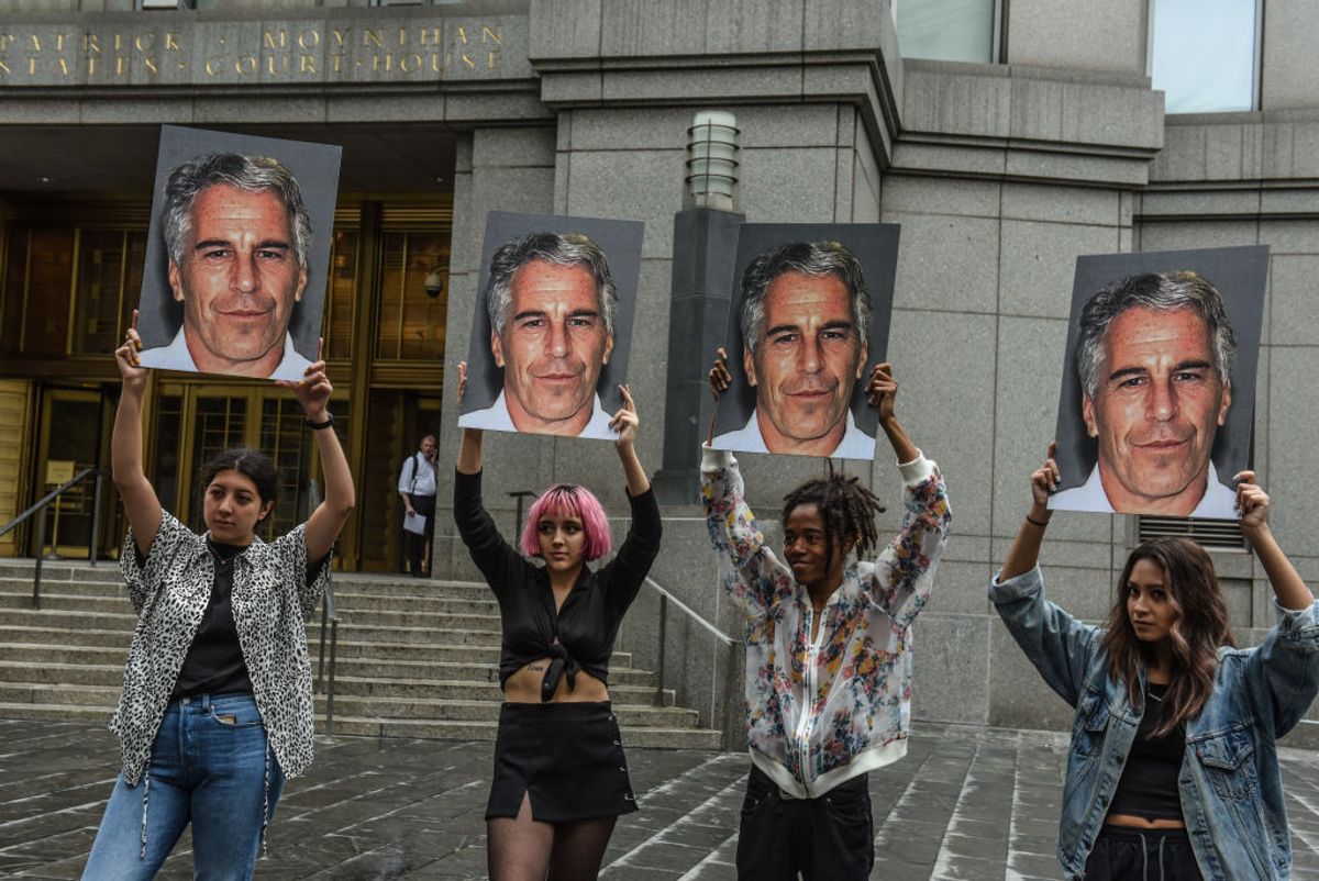 NEW YORK, NY - JULY 08: A protest group called "Hot Mess" hold up signs of Jeffrey Epstein in front of the Federal courthouse on July 8, 2019 in New York City. According to reports, Epstein will be charged with one count of sex trafficking of minors and one count of conspiracy to engage in sex trafficking of minors. (Photo by Stephanie Keith/Getty Images) (Getty Images)