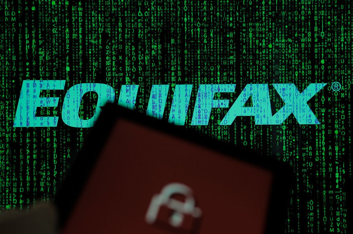 An Equifax logo is seen in this photo illustration on 20 October, 2017. The consumer credit reporting agency was hacked twice in 2017. In the last attack in July financial data belonging to over 145 million Americans was stolen including social security numbers, credit card numbers and addresses. (Photo by Jaap Arriens/NurPhoto via Getty Images) (Getty Images)