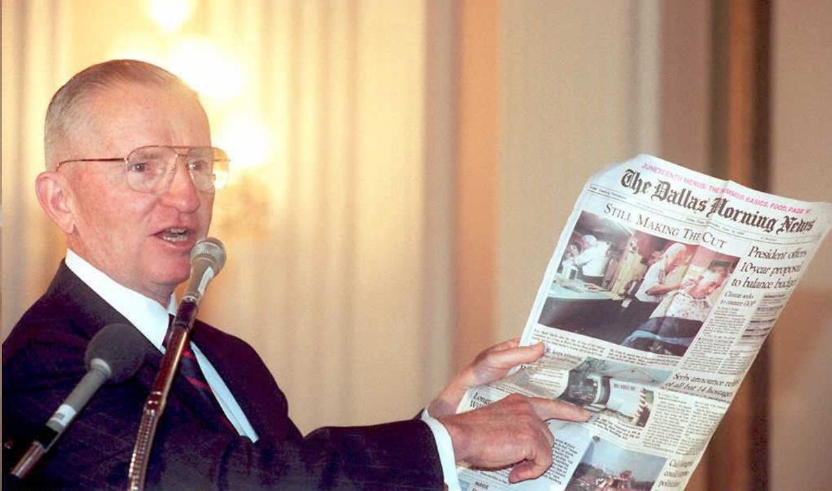 WASHINGTON, DC - JUNE 14:  Texas billionaire Ross Perot holds up a newspaper containing US President Bill Clinton's proposal for balancing the federal budget during a breakfast meeting at the Texas Breakfast Club in Washington, DC 15 June. Perot praised Clinton's propasal while still leaving open the prospect that he may enter the 1996 presidential race. AFP PHOTO  (Photo credit should read JOYCE NALTCHAYAN/AFP/Getty Images) (Getty Images)