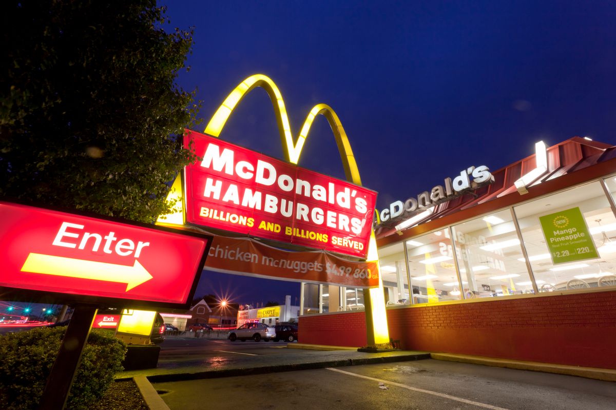 Westbury, NY, USA - August 9, 2011: The golden arches frame the McDonald's sign on Old Country Road in Westbury, New York. The giant golden arches are a classic symbol along America's suburban byways. (Getty Images)