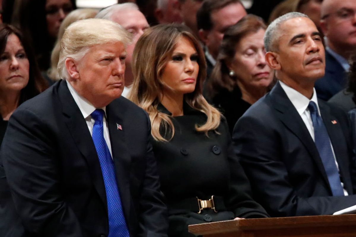 WASHINGTON, DC - DECEMBER 05: (AFP OUT) President Donald Trump, first lady Melania Trump and former President Barack Obama listen as former Canadian Prime Minister Brian Mulroney speaks during the state funeral for former U.S. President George H. W. Bush at the Washington National Cathedral on December 5, 2018 in Washington, DC. President Bush will be buried at his final resting place at the George H.W. Bush Presidential Library at Texas A&amp;M University in College Station, Texas. A WWII combat veteran, Bush served as a member of Congress from Texas, ambassador to the United Nations, director of the CIA, vice president and 41st president of the United States. (Photo by Alex Brandon - Pool/Getty Images) (Getty Images)