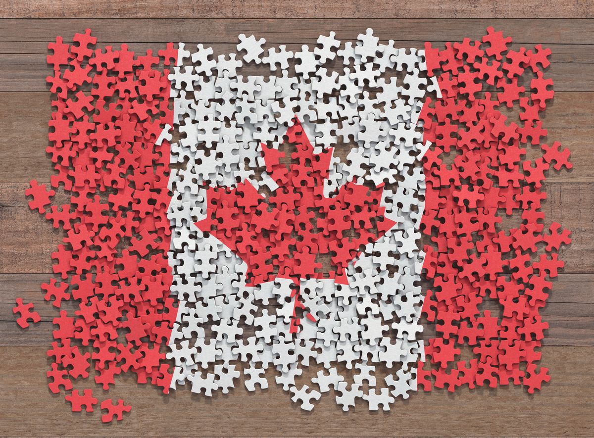Canadian flag made up of separate jigsaw puzzle pieces, illustration. (Getty Images)