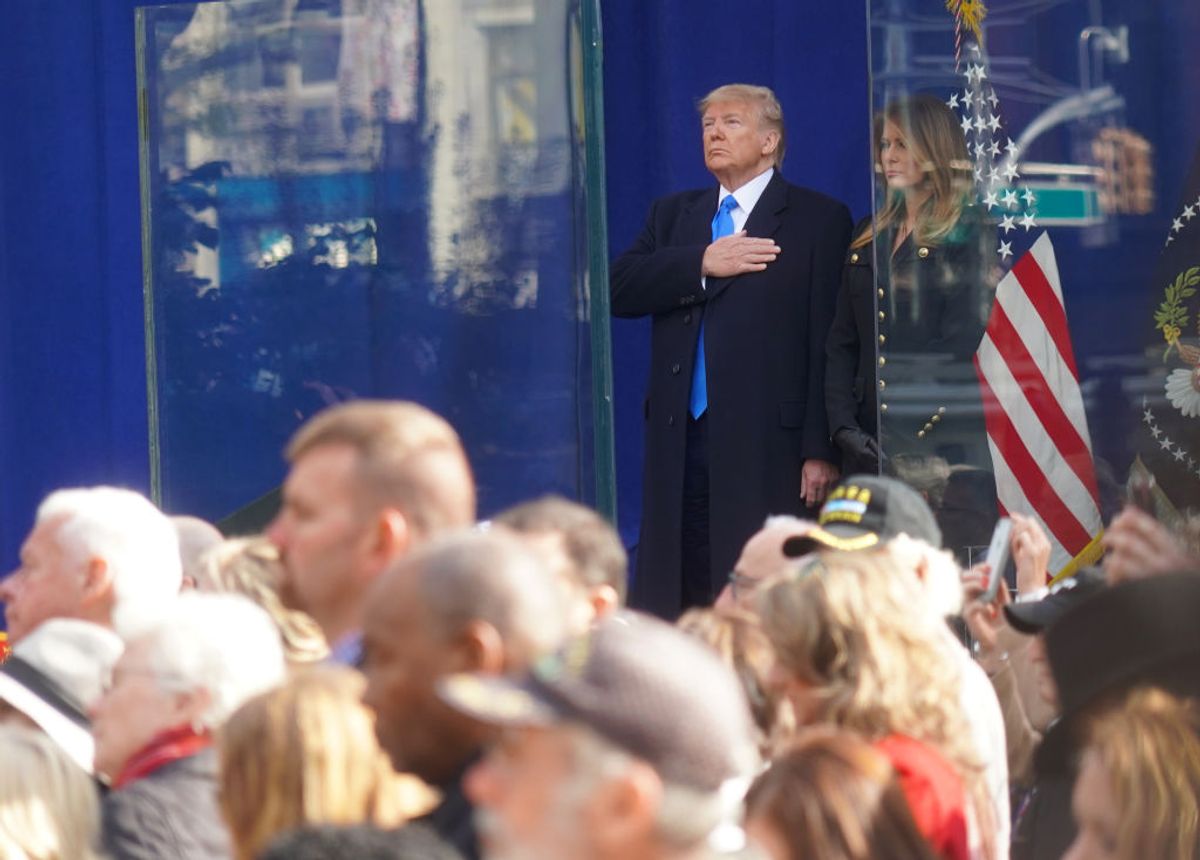 US President Donald Trump and US first Lady Melania Trump listen to Taps during a Veterans Day event at Madison Square Park November 11, 2019, in New York, New York. (Photo by Selcuk Acar/NurPhoto via Getty Images) (Getty Images)