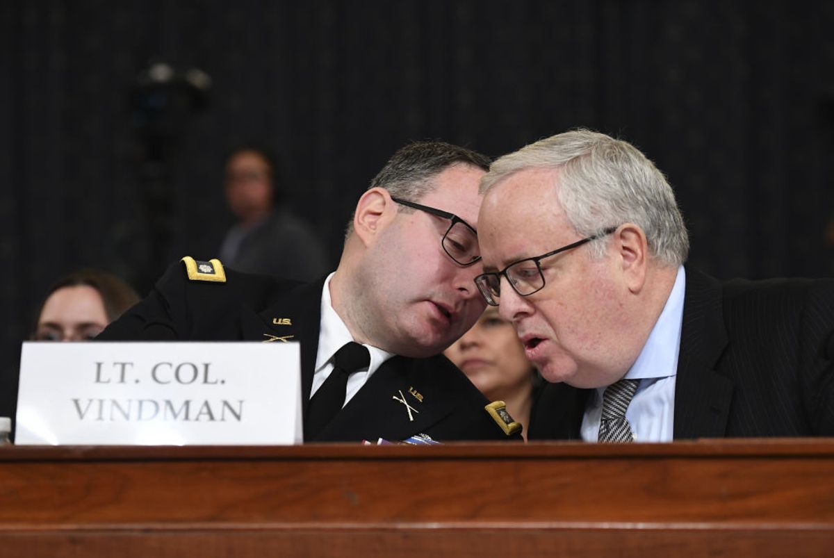 Lt. Col. Alexander Vindman (L), an expert on Eastern European affairs on the National Security Council, confers with his attorney Michael Volkov, while testifying before the House Permanent Select Committee on Intelligence as part of the impeachment inquiry into President Donald Trump, on Capitol Hill in Washington, DC, on Tuesday, November 19, 2019.  The hearings are looking into whether Trump used military aid as leverage to pressure Ukraine into investigations that would benefit him politically.   Photo by Kevin Dietsch/UPI- PHOTOGRAPH BY UPI / Barcroft Media (Photo credit should read UPI / Barcroft Media / Barcroft Media via Getty Images) (Getty Images)