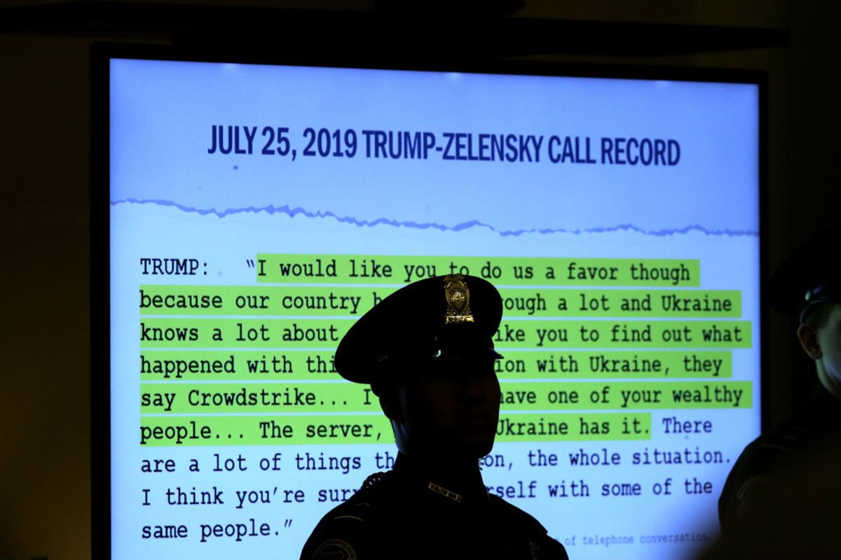 WASHINGTON, DC - NOVEMBER 19: A transcript of a phone call between U.S. President Donald Trump and Ukrainian President Volodymyr Zelensky is displayed as Lt. Col. Alexander Vindman, National Security Council Director for European Affair and Jennifer Williams, adviser to Vice President Mike Pence for European and Russian affairs, testify before the House Intelligence Committee in the Longworth House Office Building on Capitol Hill November 19, 2019 in Washington, DC. The committee heard testimony during the third day of open hearings in the impeachment inquiry against U.S. President Donald Trump, who House Democrats say withheld U.S. military aid for Ukraine in exchange for Ukrainian investigations of his political rivals. (Photo by Drew Angerer/Getty Images) (Getty Images)