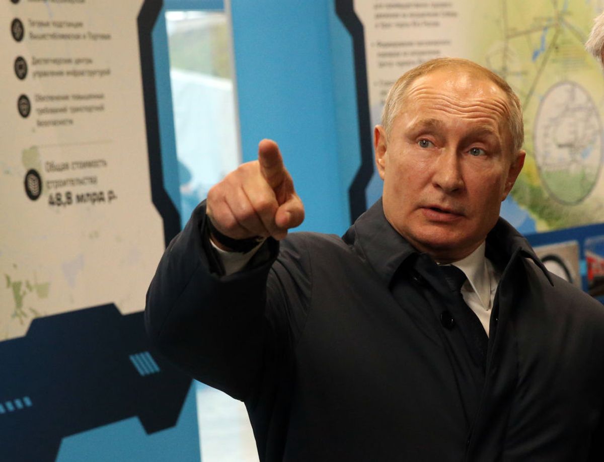 TAMAN, RUSSIA - DECEMBER 23:  Russian President Vladimir Putin points while visiting the exhibition after riding a train across the bridge linking Russia and Crimean Peninsula at Taman railways station on December 23, 2019 near Anapa, Russia. Putin on Monday inaugurated a raliway bridge to Crimea, the longest in Europe, which is intended facilitate links with Crimea, a disputed territory, which Russia annexed from Ukraine in 2014. (Photo by Mikhail Svetlov/Getty Images) (Mikhail Svetlov/Getty Images)