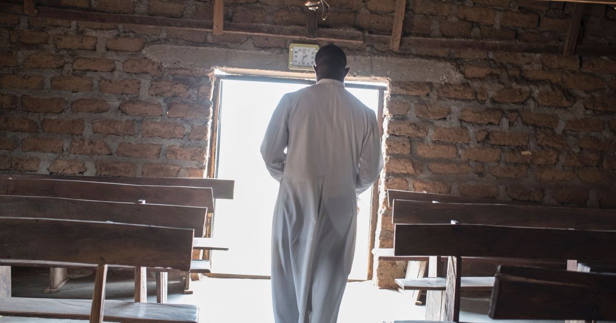 A reverend walks in Saint Moses Catholic Church in the village of Bakin Kogi, in Kaduna state, northwest Nigeria, that was recently attacked by suspected Fulani herdsmen, on February 24, 2017. 
Long-standing tensions between herdsmen and farmers have flared up again in Kaduna state, northern Nigeria, leaving possibly hundreds dead in tit-for-tat violence. Last weekend at least 21 people were killed and several homes were destroyed when suspected cattle drivers attacked five farming communities.But the clashes between the Muslim, largely Hausa-speaking Fulani cattle drivers and the mainly Christian farmers have escalated since December, when a Fulani chief was killed.
 / AFP / STEFAN HEUNIS        (Photo credit should read STEFAN HEUNIS/AFP via Getty Images) (STEFAN HEUNIS/AFP via Getty Images)
