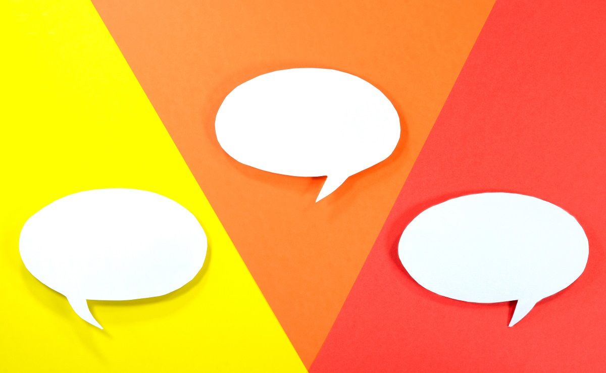 Speech bubble on multicolored background. (Getty Images, stock)
