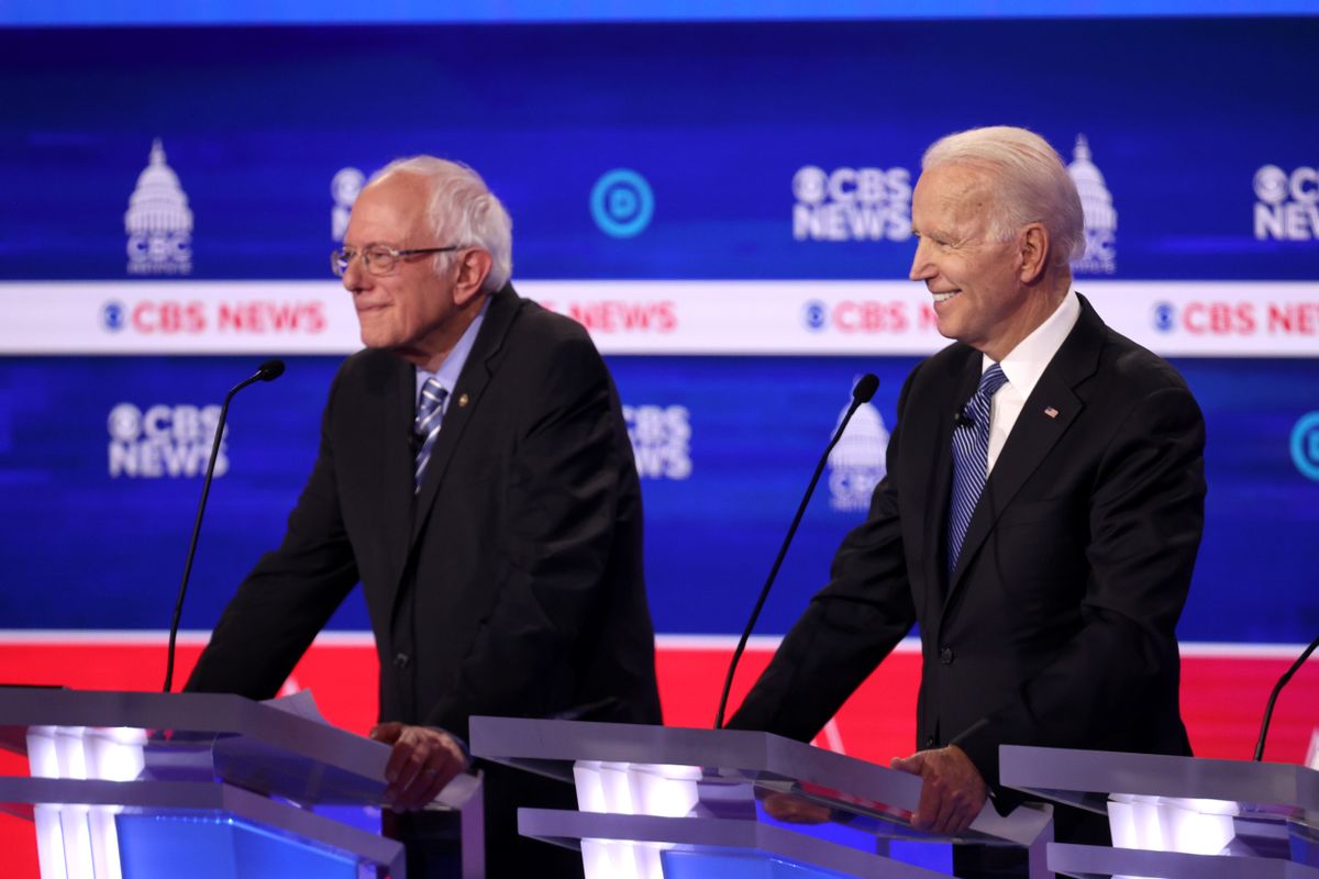 CHARLESTON, SOUTH CAROLINA - FEBRUARY 25: Democratic presidential candidate former Vice President Joe Biden smiles as Sen. Bernie Sanders (I-VT) (L) looks on during the Democratic presidential primary debate at the Charleston Gaillard Center on February 25, 2020 in Charleston, South Carolina. Seven candidates qualified for the debate, hosted by CBS News and Congressional Black Caucus Institute, ahead of South Carolina’s primary in four days.  (Photo by Win McNamee/Getty Images) (Win McNamee/Getty Images)