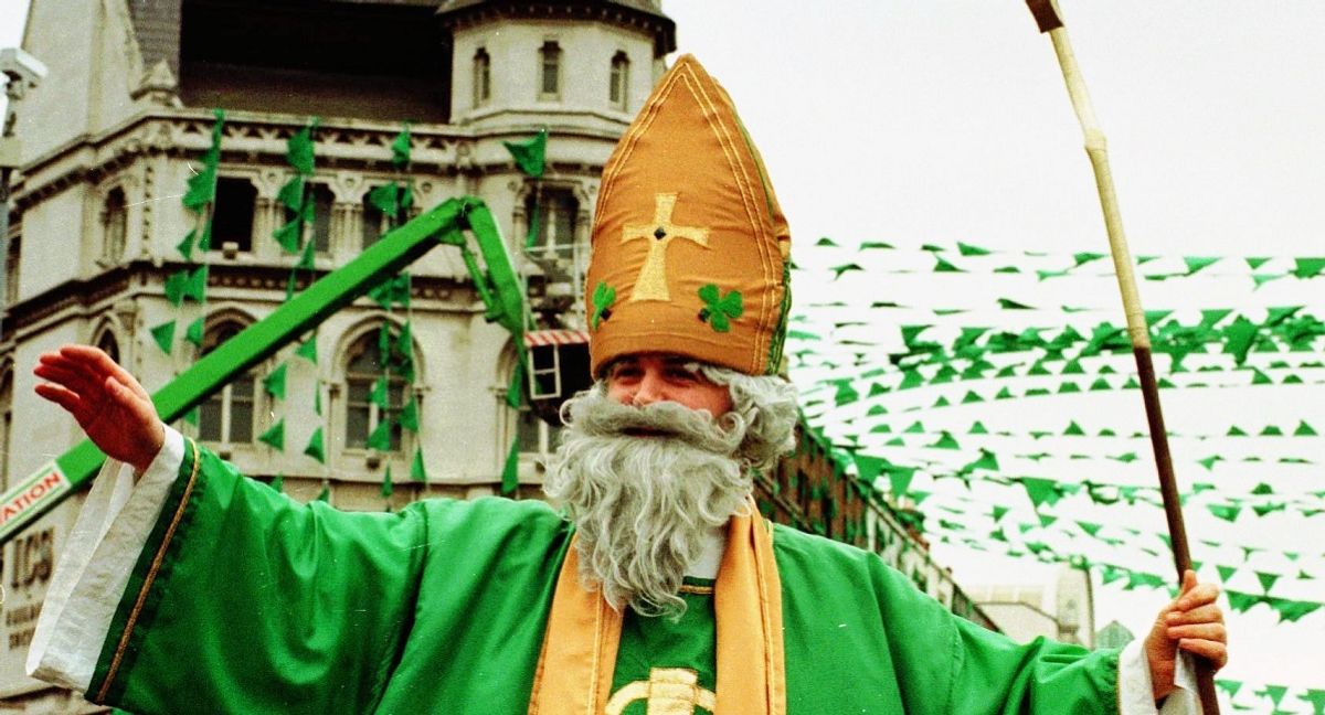 A person dressed as Saint Patrick blesses the crowd in Dublin as the parade makes its way through the Irish capital Tuesday, March 17, 1998. The Dublin parade was the biggest St. Patrick's pageant in Ireland Tuesday which lasted several hours. (AP Photo/John Cogill) (AP Photo / John Cogill)