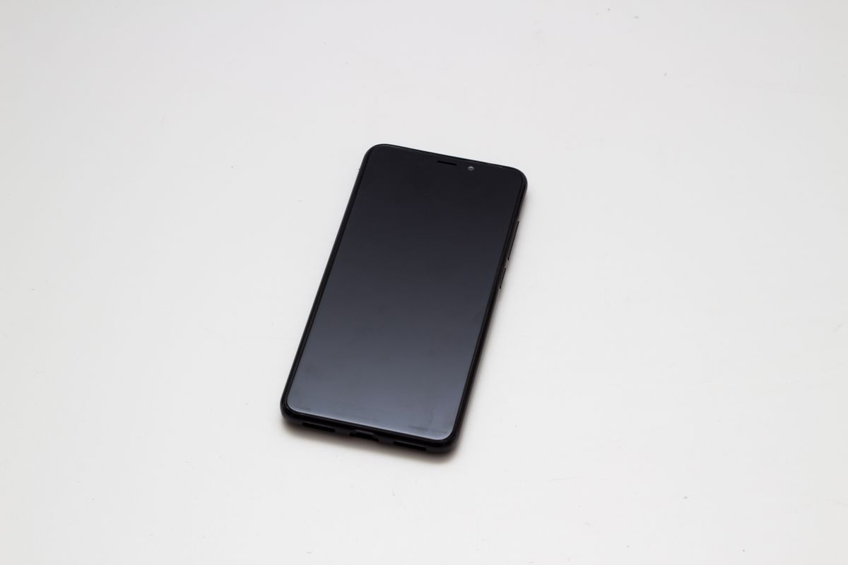 close-up of a smart phone on a white background (Getty Images)
