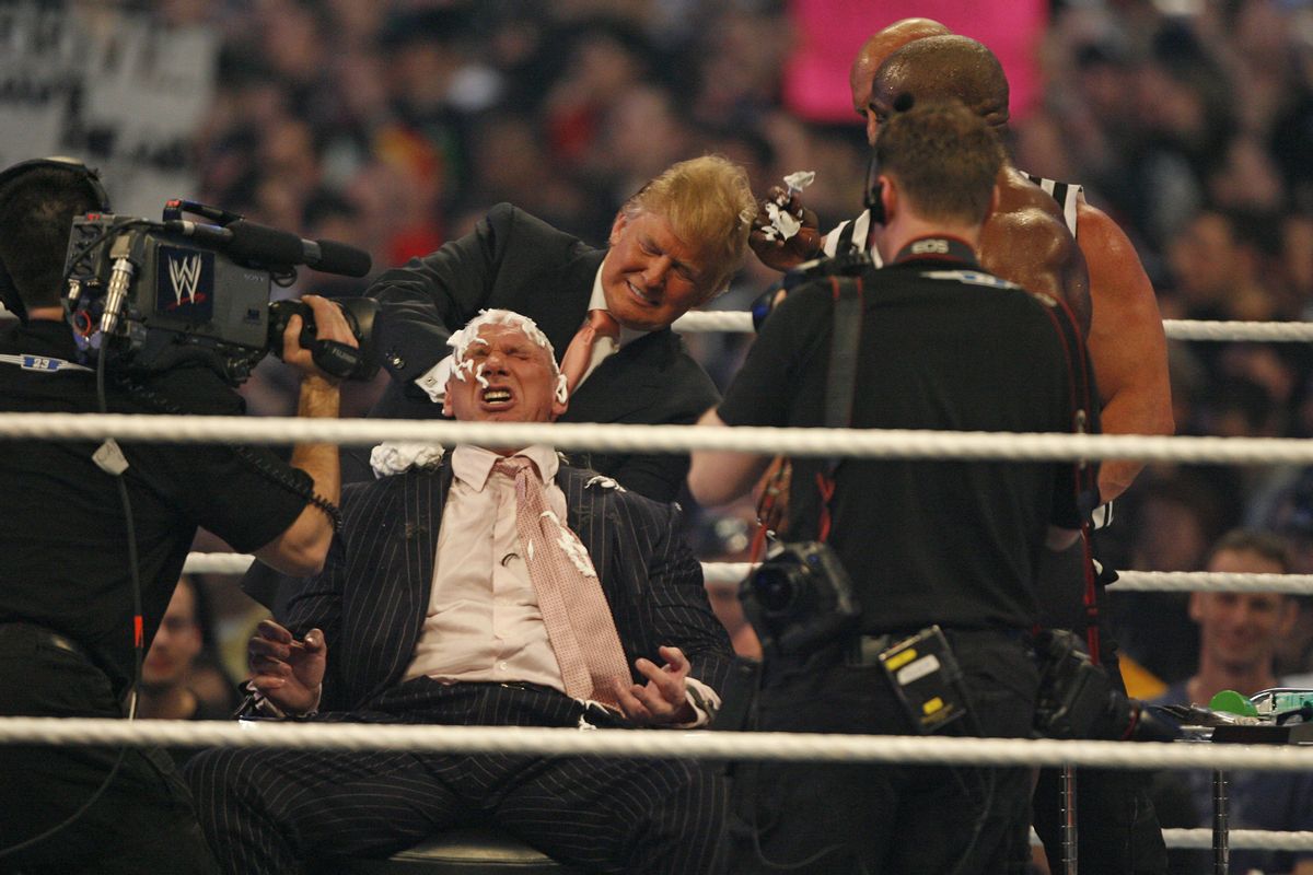 Vince McMahon gets his head shaved by Stone Cold Steve Austin after as Donald Trump looks on at WrestleMania 23 at Detroit's Ford Field, Detroit Michigan. April 1, 2007 (Photo by Leon Halip/WireImage) (Leon Halip/WireImage)