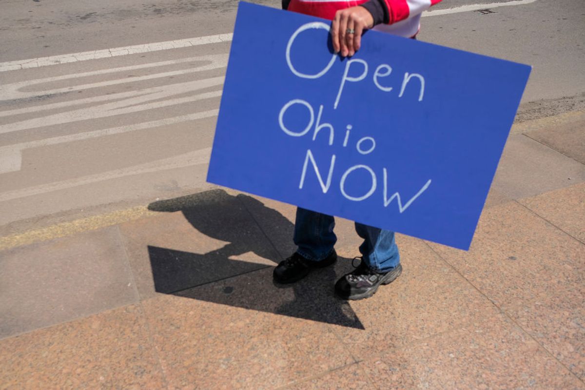 COLUMBUS, OH - APRIL 20: Protesters gather at the Ohio Statehouse to protest the 'Stay at Home' order on April 20, 2020 in Columbus, Ohio. The order was put into place by Governor Mike DeWine on March 23rd, in effect until May 1st, in hopes of slowing the spread of the coronavirus (COVID-19) in Ohio. (Photo by Matthew Hatcher/Getty Images) (Getty Images)