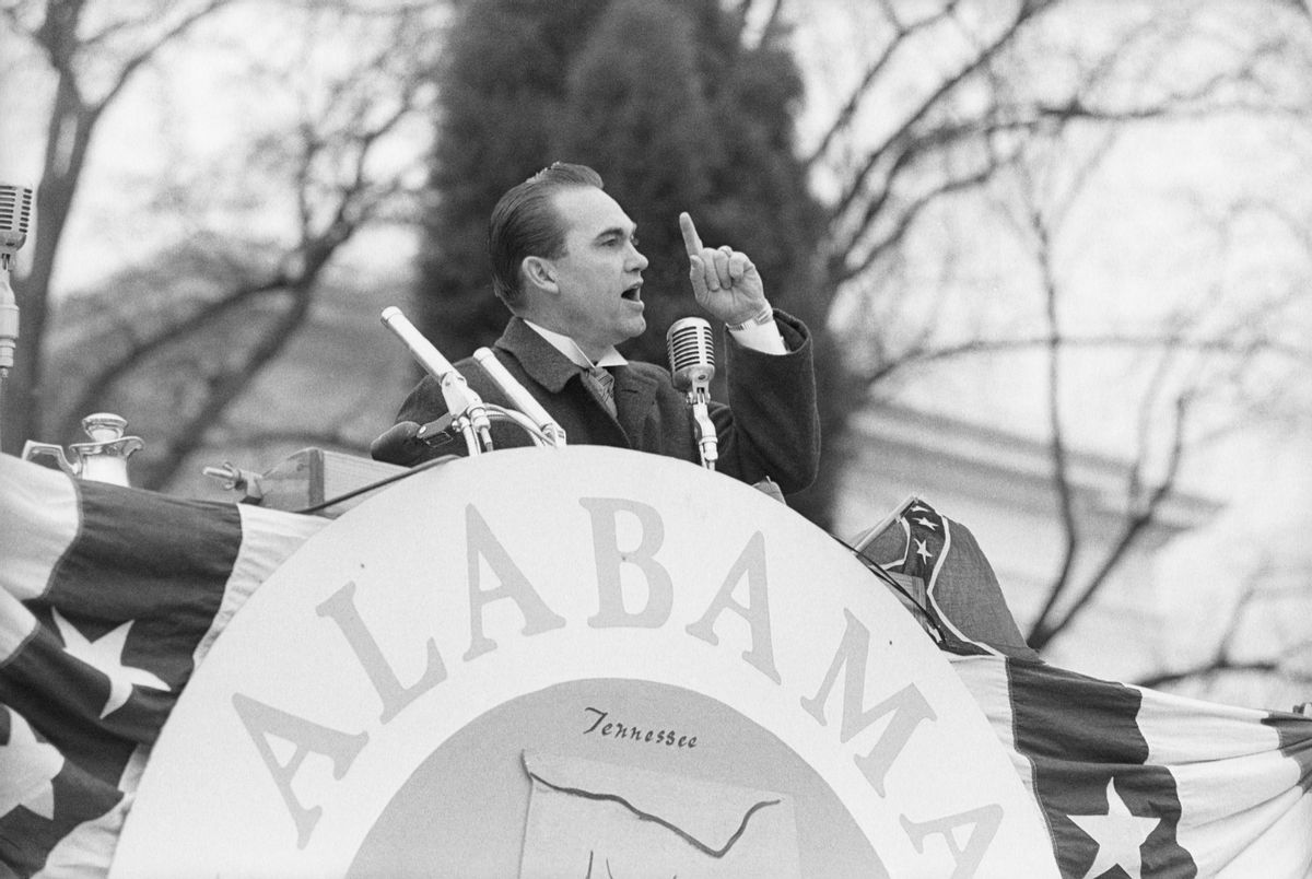 Alabama governor George C. Wallace promises "segregation now, segregation tomorrow, segregation forever" during his 1963 inaugural address. In June of 1963, Wallace blocked the door to a University of Alabama building to prevent the court-ordered enrollment of two black students, until federal marshals forced him to step aside. He quickly became a symbol of resistance to integration. In later years, Wallace publicly claimed remorse for his actions, stating that he had never been a racist at heart. (Getty Images)