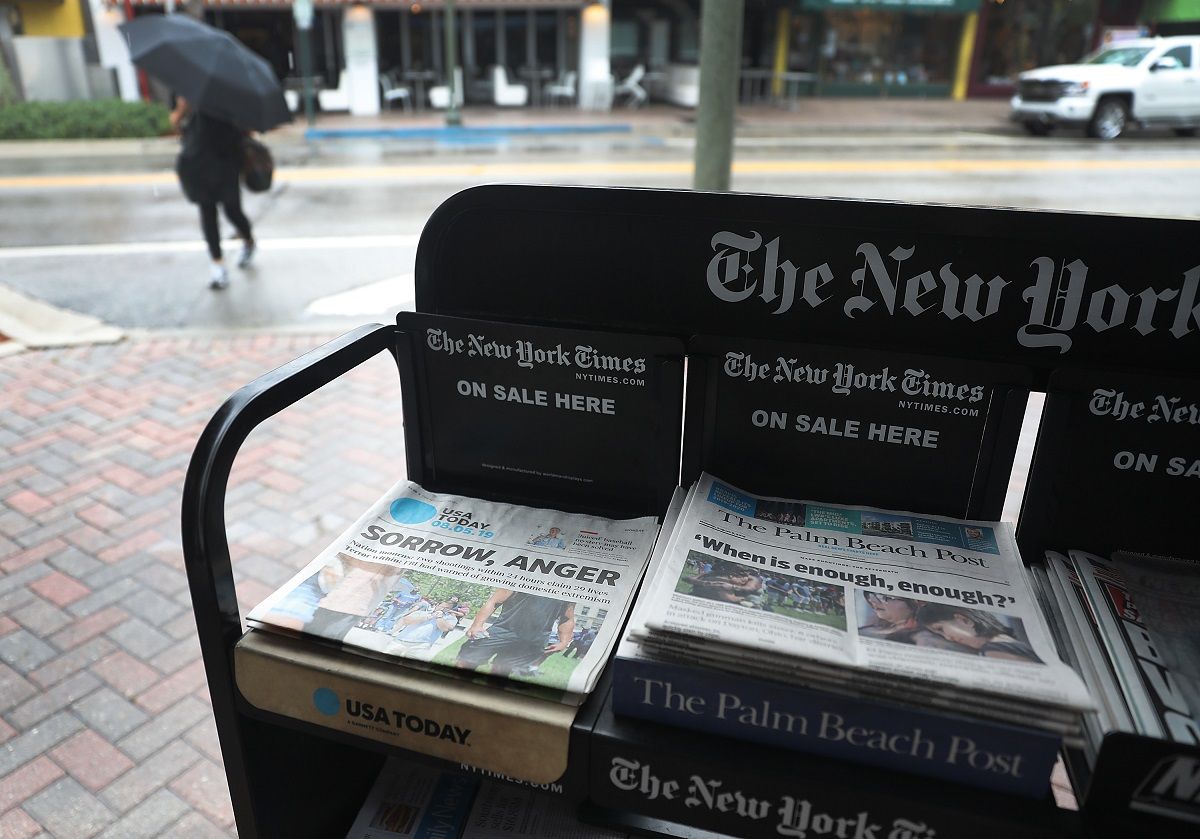 PALM BEACH, FLORIDA - AUGUST 05: A GateHouse Media owned Palm Beach Post and the Gannett Co. owned USA Today are seen for sale at a newsstand on August 05, 2019 in Palm Beach, Florida. GateHose Media announced an agreement to acquire Gannett Co. Inc, which would create the largest local news publishing organization in the U.S.  (Photo by Joe Raedle/Getty Images) (Joe Raedle / Getty Images)