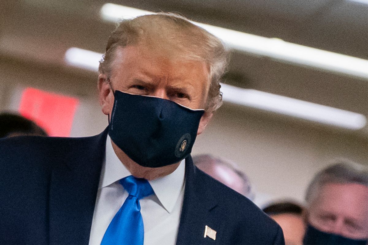 US President Donald Trump wears a mask as he visits Walter Reed National Military Medical Center in Bethesda, Maryland' on July 11, 2020. (Photo by ALEX EDELMAN / AFP) (Photo by ALEX EDELMAN/AFP via Getty Images) (ALEX EDELMAN/AFP via Getty Images)