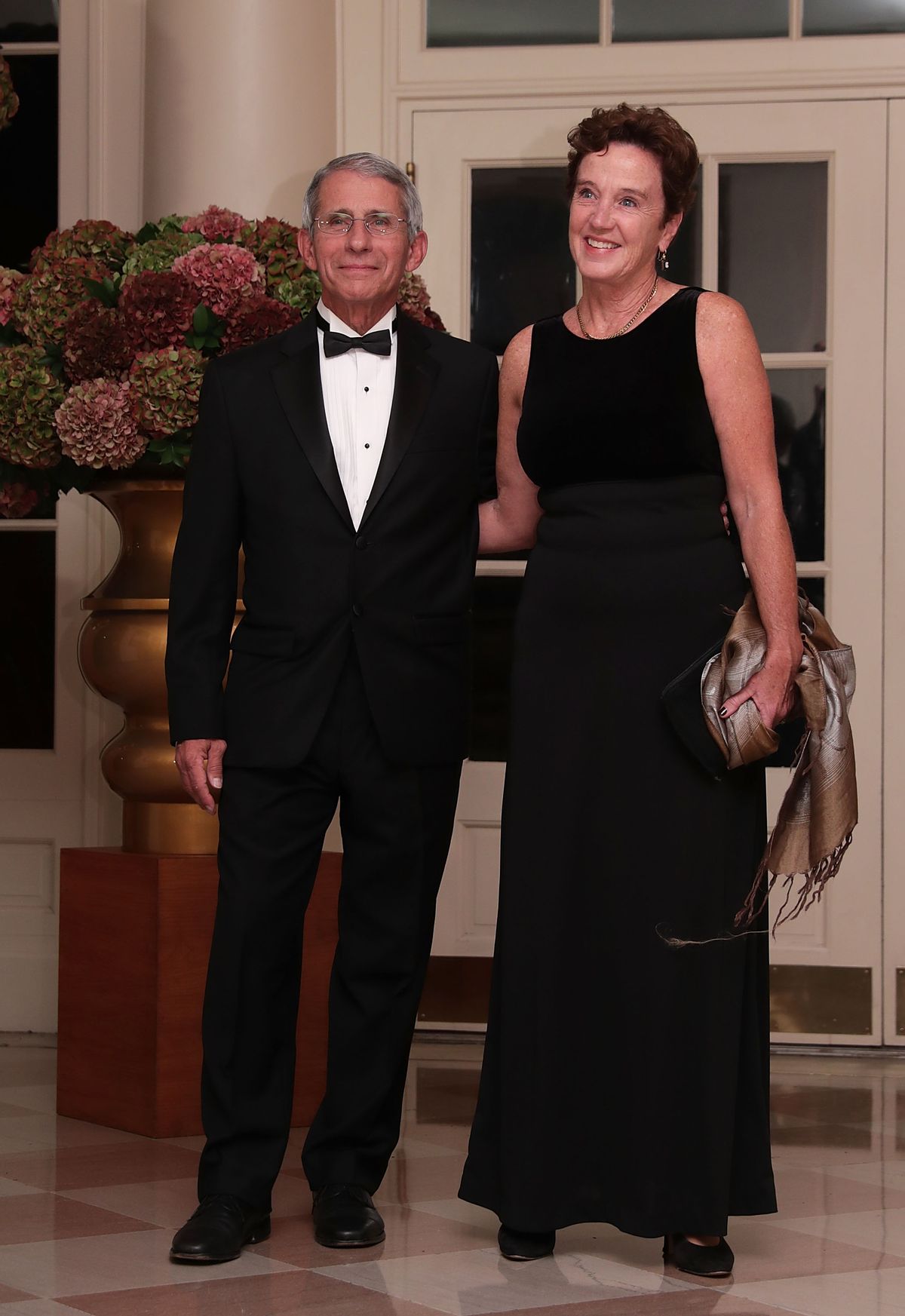 WASHINGTON, DC - OCTOBER 18:  Director of the National Institute of Allergy &amp; Infectious Diseases at the National Institute of Health Anthony Fauci and his wife Christine Grady arrive at the White House for a state dinner October 18, 2016 in Washington, DC. U.S. President Barack Obama is hosting a state dinner for Prime Minister of Italy Matteo Renzi and his wife Agnese Landini.  (Photo by Alex Wong/Getty Images) (Alex Wong/Getty Images)