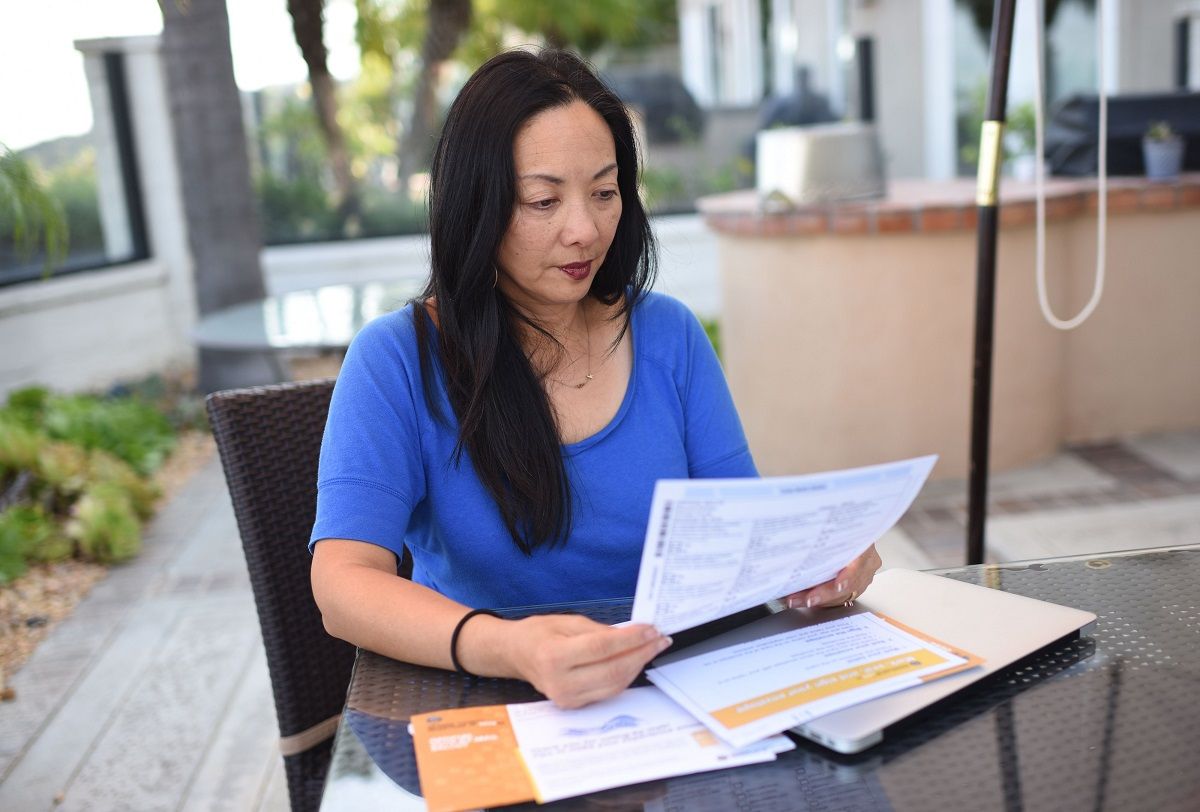 Engineer Katherine Amoukhteh looks over her mail-in ballot for the midterm elections at her home in upscale Laguna Niguel in southern California's Orange County, October 14, 2018. - Amoukhteh, a registered Republican, is supporting a Democratic candidate for congress in her district. She says her turn away from the Republican Party was motivated by her distaste for what she sees as US President Donald Trump's misogyny and racism. (Photo by Robyn Beck / AFP)        (Photo credit should read ROBYN BECK/AFP via Getty Images) (Getty Images)