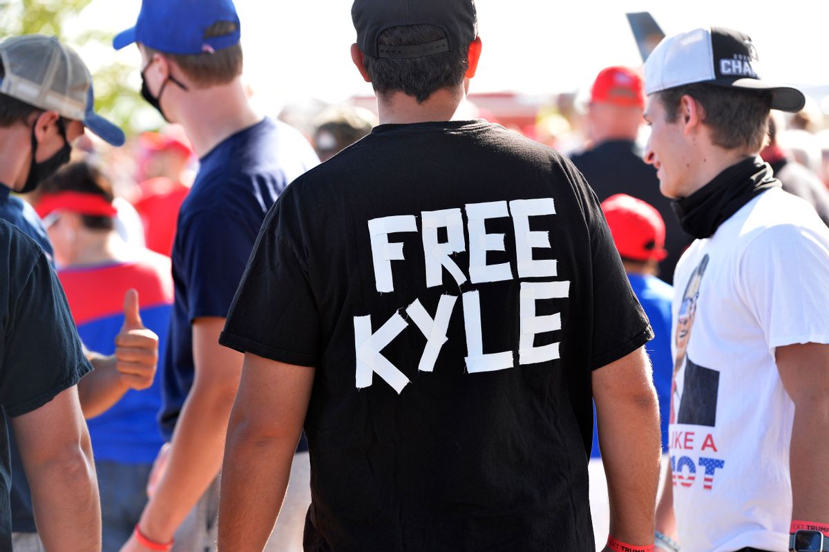 A man wears a shirt calling for freedom for Kyle Rittenhouse, 17, the man who allegedly shot protesters in Wisconsin, during a US President Donald Trump Campaign Rally, the day after the end of the Republican National Convention, at Manchester airport in Londonderry, New Hampshire on August 28, 2020. (Photo by Joseph Prezioso / AFP) (Photo by JOSEPH PREZIOSO/AFP via Getty Images) (Getty Images)