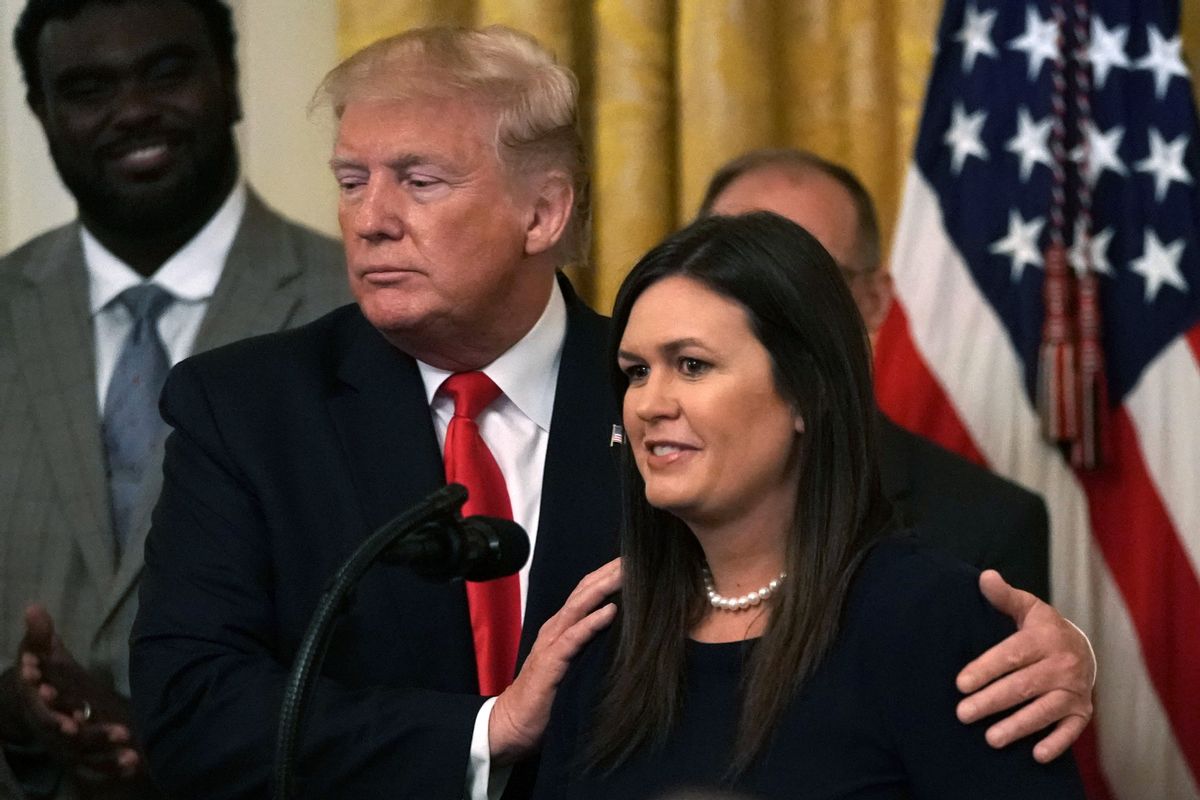 WASHINGTON, DC - JUNE 13: U.S. President Donald Trump and White House Press Secretary Sarah Sanders share a moment during an East Room event on “second chance hiring” June 13, 2019 at the White House in Washington, DC. President Trump announced that Sanders will be leaving her position at the White House. (Photo by Alex Wong/Getty Images) (Getty Images)