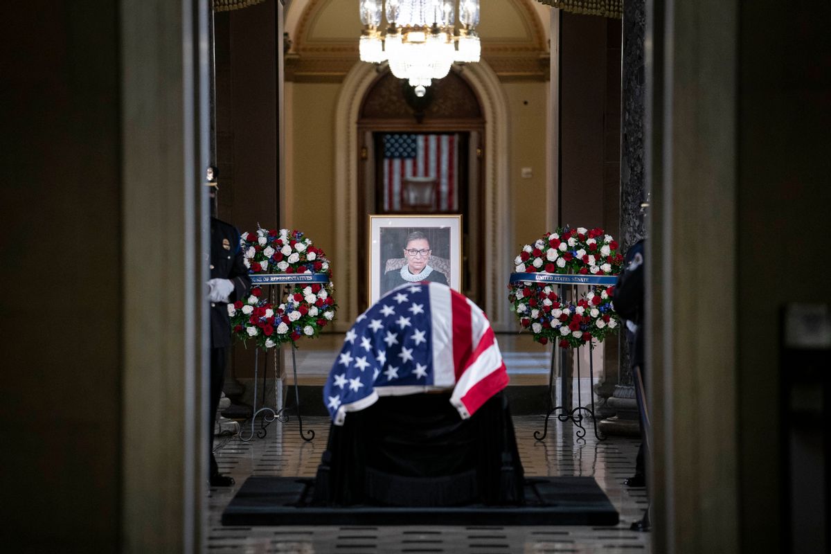 TOPSHOT - The casket of late Supreme Court Justice Ruth Bader Ginsburg is seen in Statuary Hall in the US Capitol to lie in state in Washington, DC, on September 25, 2020. (Photo by Sarah Silbiger / POOL / AFP) (Photo by SARAH SILBIGER/POOL/AFP via Getty Images) (SARAH SILBIGER / Contributor)