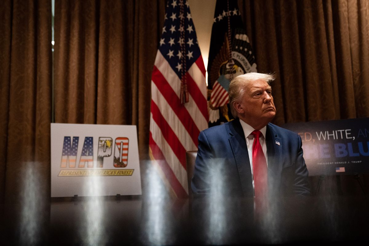 WASHINGTON, DC - JULY 31:  U.S. President Donald Trump listens during a meeting with members of the National Association of Police Organizations Leadership in the Cabinet Room of the White House July 31, 2020 in Washington, DC.  (Photo by Anna Moneymaker-Pool/Getty Images) (Anna Moneymaker-Pool/Getty Images)