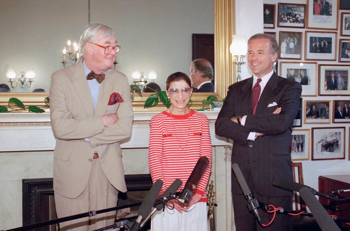 Judge Ruth Bader Ginsburg poses with Sen. Daniel Patrick Moynihan, D-N.Y., left, and Sen. Joseph Biden, D-Del., chairman of the Senate Judiciary Committee, on Tuesday, June 15, 1993 on Capitol Hill in Washington. Sen. Moynihan escorted the appeals judge, President Bill Clinton's choice for the Supreme Court vacancy, who was paying a courtesy call on Capitol Hill Tuesday. Sen. Biden's committee will hold her nomination hearings. (AP Photo/Marcy Nighswander) (AP / Marcy Nighswander)