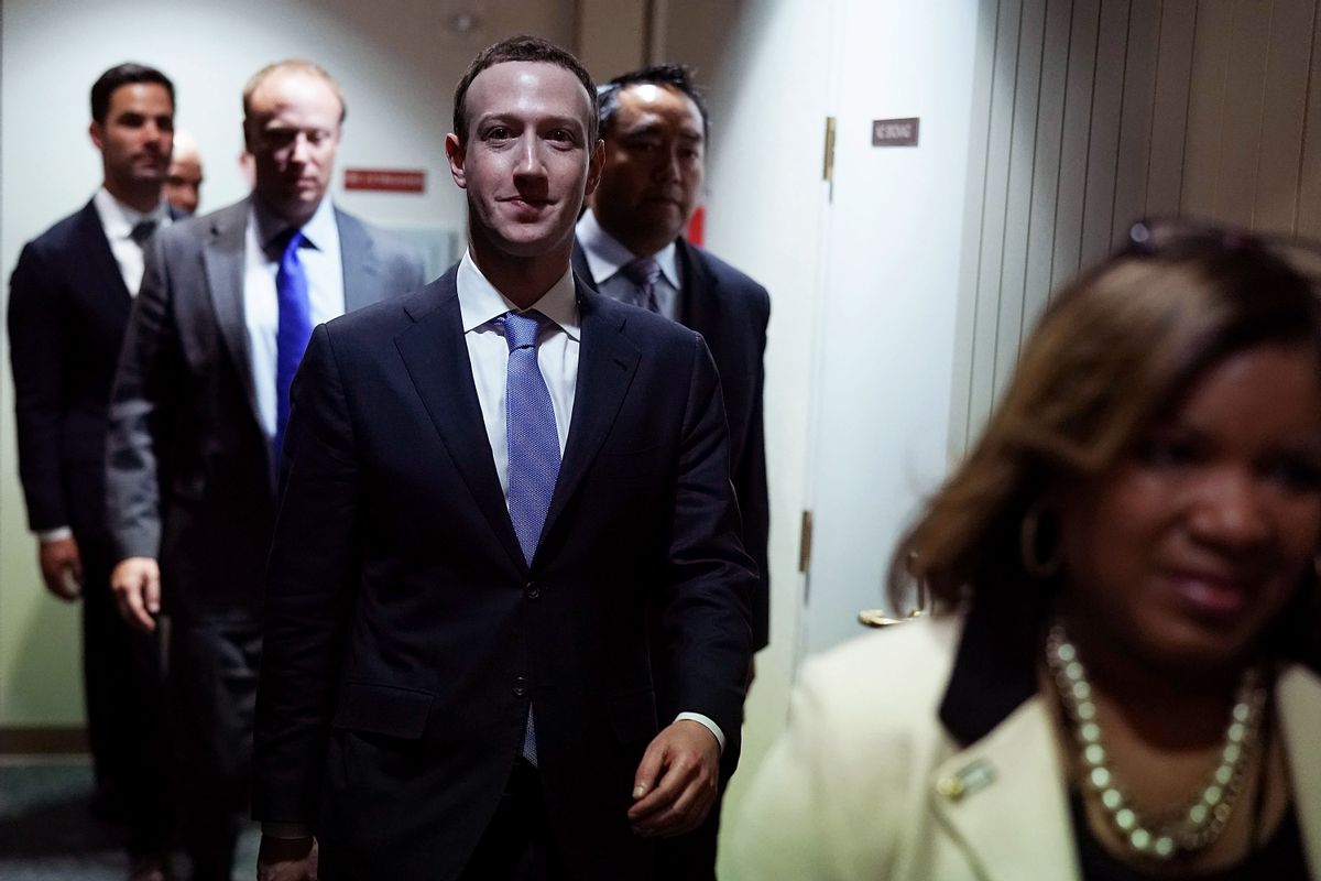 WASHINGTON, DC - APRIL 10:  Facebook co-founder, Chairman and CEO Mark Zuckerberg leaves after he testified before a combined Senate Judiciary and Commerce committee hearing in the Hart Senate Office Building on Capitol Hill April 10, 2018 in Washington, DC. Zuckerberg, 33, was called to testify after it was reported that 87 million Facebook users had their personal information harvested by Cambridge Analytica, a British political consulting firm linked to the Trump campaign.  (Photo by Alex Wong/Getty Images) (Alex Wong/Getty Images)