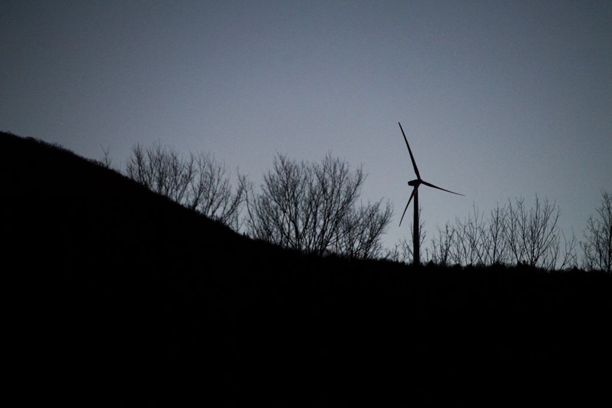 UNITED STATES - NOVEMBER 22: A wind turbine is seen above Sugar Hollow Road in Wyoming County, Pa., on November 22, 2018. (Photo By Tom Williams/CQ Roll Call) (Tom Williams/CQ Roll Call)