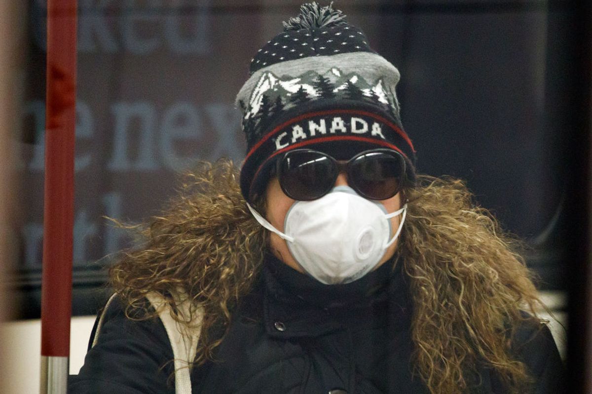 TORONTO, ON - APRIL 01: A woman is seen wearing a mask in the subway during morning commuting hours as Toronto copes with a shutdown due to the Coronavirus, on April 1, 2020 in Toronto, Canada. Prime Minister Justin Trudeau said the government would spend $2 billion on testing and to buy critical supplies including ventilators and personal protective equipment. (Photo by Cole Burston/Getty Images) (Getty Images, stock)